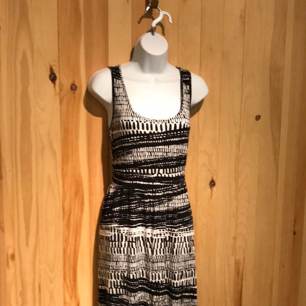Maxi dress or bathing suit coverup.  Black and white.  High low hem.
